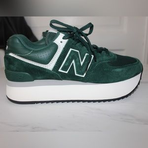 10.5 US Women’s Green and white platform new balance sneakers.